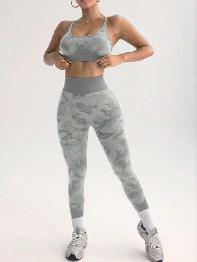 SHEIN Sport Gameset مجموعة ملابس نسائية فاشينيا مكونة من تانك توب قصير بظهر متقاطع والسروال الضيق للملابس الرياضية، طقم ألعاب رياضية