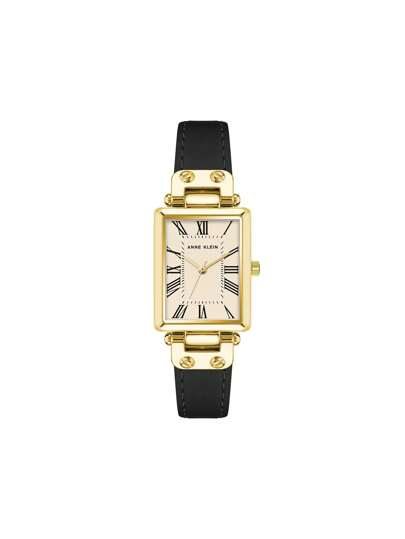 Anne Klein ساعة كوارتز بسوار جلد أسود للنساء، قرص نسيجي كريمي، حالة بلون ذهبي، أنيقة وعصرية، مناسبة كهدية للسيدات، AK/3752CRBK