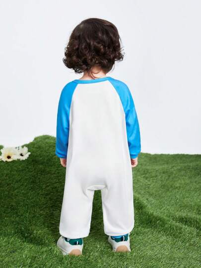 Teletubbies X SHEIN جمبسوت كاجوال عصرية للطفل الصبي بطباعة نجوم ملونة وشخصيات كرتونية، بلون أزرق وأبيض