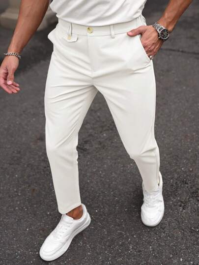 ملابس رجالي Manfinity Mode بناطيل عمل كاجوال واسعة القدمين باللون الواحد مع جيب