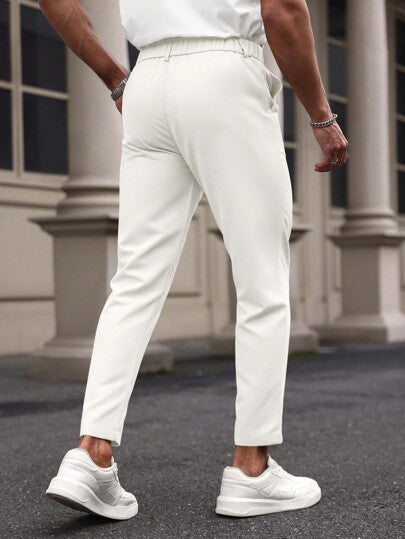 ملابس رجالي Manfinity Mode بناطيل عمل كاجوال واسعة القدمين باللون الواحد مع جيب