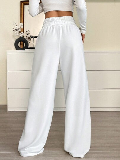 SHEIN EZwear بنطلون رياضي فضفاض واسع الساق منسوج بخصر قابل للسحب للنساء باللون الموحد