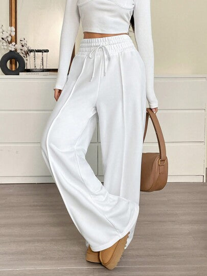 SHEIN EZwear بنطلون رياضي فضفاض واسع الساق منسوج بخصر قابل للسحب للنساء باللون الموحد