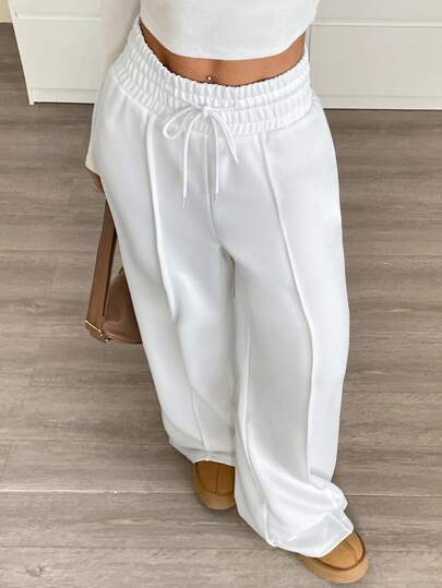 SHEIN EZwear بنطلون رياضي فضفاض واسع الساق منسوج بخصر قابل للسحب للنساء باللون الموحد