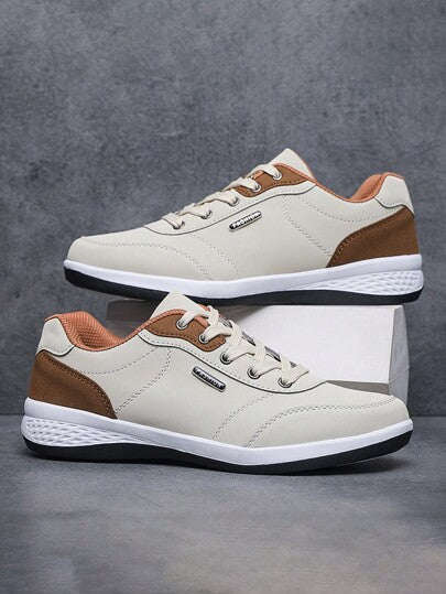 زوج من أحذية الرجال الرياضية ذات التهوية الجيدة، أحذية كاجوال للرجال للمنافسات، أحذية رياضية عصرية للرجال