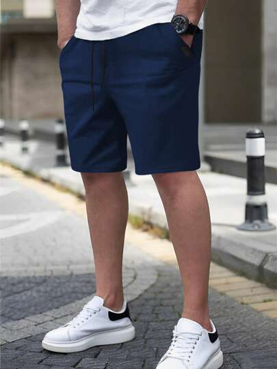 Manfinity Homme شورت رجالي بخصر مطاطي أبيض اللون مع جيوب ، كاجوال