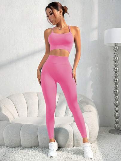 SHEIN Sport Studio بدلة رياضية للنساء تتكون من سترة كامي ذات ظهر مفتوح وبنطلون 7/8 بلون أحادي