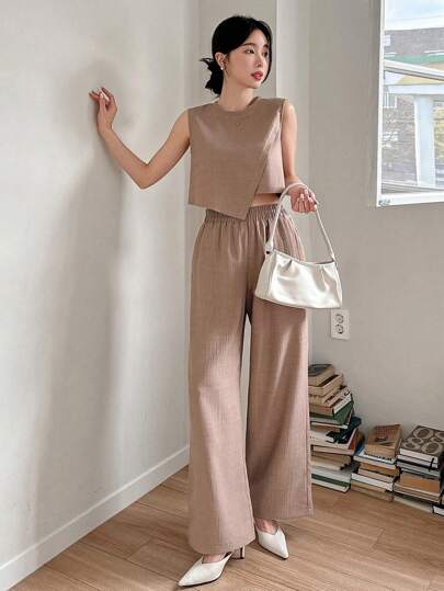 DAZY بلوزة ذات لون واحد وبنطلون ذا سيقان واسعة طقم للنساء 2 قطعة