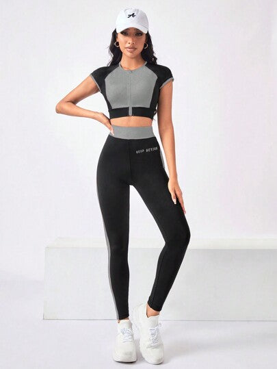 SHEIN Sport Studio مجموعة رياضية مُطبقة المرأة تتكون من 2 قطعة: ملابس علوية قصيرة الأكمام بياقة طاقم مزودة بسحاب، وبنطال طويل ، مجموعة ملابس رياضية للنساء