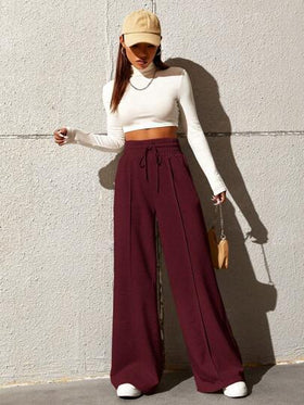 SHEIN EZwear بنطلون رياضي واسع الساق ذو خصر مرن قابل للربط، لون سادة متعدد الاستخدامات