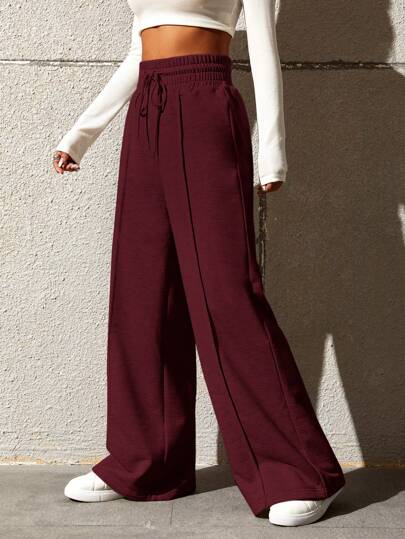 SHEIN EZwear بنطلون رياضي واسع الساق ذو خصر مرن قابل للربط، لون سادة متعدد الاستخدامات