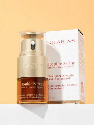 Clarins [CLARINS] [ميني] مركز سيروم مزدوج كامل للتحكم في العمر 20مل جائزة | مضاد للشيخوخة | يشد ويقلل مرئيًا من التجاعيد ويزيد من نضارة البشرة | 21 مكون نباتي بما في ذلك الكركم | لجميع أنواع وأعمار وأعراق البشرة