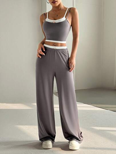 SHEIN Unity طقم رياضي عصري على الطراز الأمريكي - توب أكمام لامع رمادي مع حوافٍ متباينة وبنطال طويل متوسط الخصر، بدلة سيدات من قطعتين للصيف