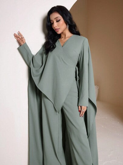 Veilorie جمبسوت أنيقة للنساء سادة اللون بياقة على شكل V وأكمام على شكل خفاش