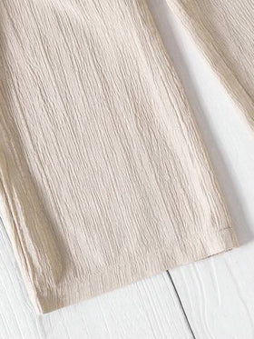 SHEIN سروال فضفاض مناسب للشاطئ من قماش بملمس مخملي بلون المشمش، تصميم متعدد الاستخدامات مريح وأناقة لفتيات المراهقة في مجموعة ربيع/صيف جديدة، تنسق مع ملابس الأم والأخت
