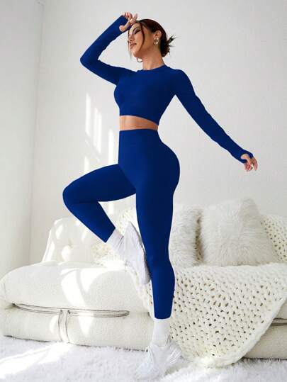 SHEIN Sport Studio طقم رياضي للنساء، أكمام طويلة ظهر مكشوف و بنطلون طويل ، مواد عالية المرونة ،أحادي اللون ،مجموعة تنورة وبنطلون للنساء