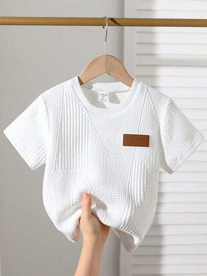 SHEIN تي شيرت كاجوال بأكمام قصيرة ذات لون أحادي بسيطة للأولاد الصغار