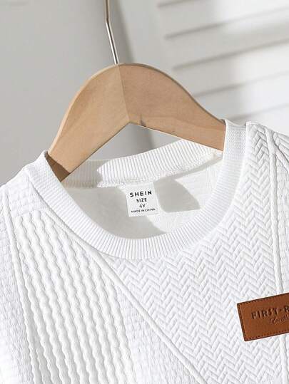 SHEIN تي شيرت كاجوال بأكمام قصيرة ذات لون أحادي بسيطة للأولاد الصغار