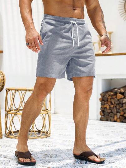 Manfinity Homme شورت رجالي فضفاض مكون من خيط ورقعة بشعارات، شورت رجالي صيفي عادي، ملابس رجالية