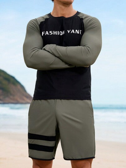 Manfinity Swimmode 2 قطعة طقم تي شيرت وسروال سباحة رجالي من قماش راجلان بطباعة حرفية وتباين اللون، نمط هاواي