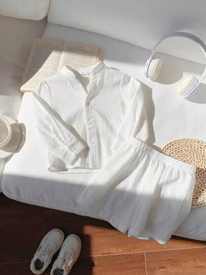 SHEIN مجموعة قميص وشورت سترة غير رسمية بياقة واقفة ملبسة للأطفال والرضع قطعتان، قماش صلب بألوان سادة، أكمام طويلة، مناسبة للربيع والصيف والخارج والعطلات والاستعمال اليومي