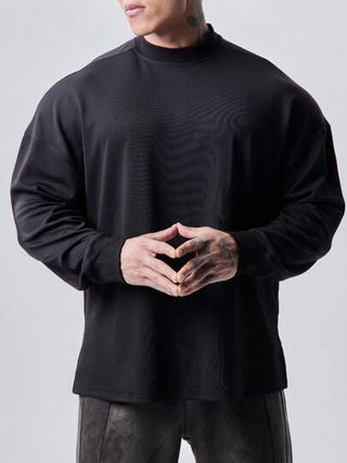 Manfinity Sport Corelite تي شيرت رجالي كاجوال طويل الأكمام قصة فضفاضة بلون سادة