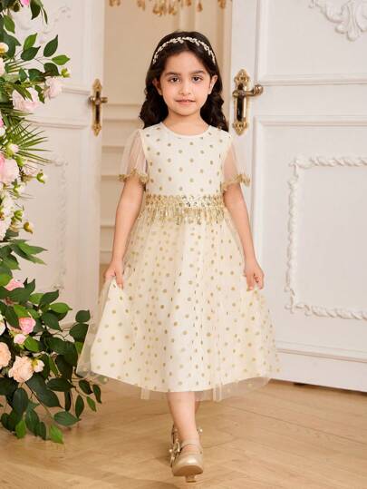 فستان أطفال Glamorique Kids فستان من الشباك الحريري بنقش البولكا نقاط الذهبي والثريا، قماش شفاف ملؤه الأحلام، مناسب لحفلات عيد الميلاد والمناسبات العائلية، يمكّن الفتيات الصغيرات من جذب الأنظار وإبراز حلاوتهن وأناقتهن