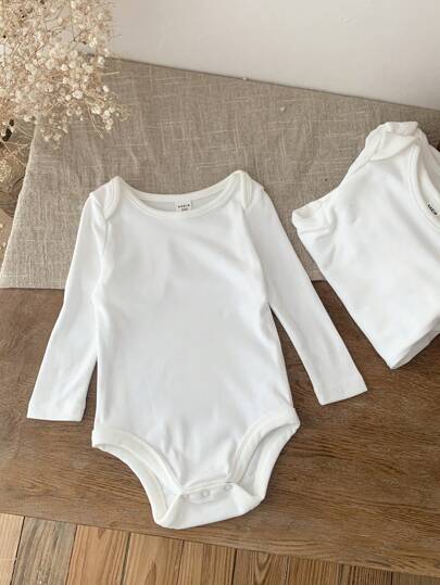 SHEIN LMoss Kids 4 قطع طقم هدية لحديثي الولادة من البنات، بوديسوت صلبة اللون مرنة مصنوعة من الصوف المحبوك، مناسبة للخريف والشتاء