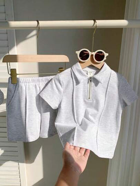 SHEIN 2 قطعة / مجموعة قميص بولو نسيج مضفر فضفاض بلون واحد وشورت مناسبة للأطفال للخروج، العودة للمدرسة، الحفلات، المناسبات، الزفاف، المعمودية، اللبس اليومي، الرياضة، الربيع/الصيف