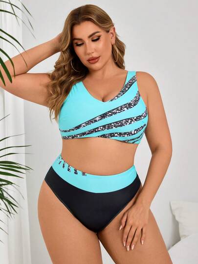 Swim Lushoire مجموعة بيكيني مقاس كبير للنساء ذات قطعتين، تصميم رقبة على شكل حرف V باللونين الأزرق والأسود، بلون مخطط