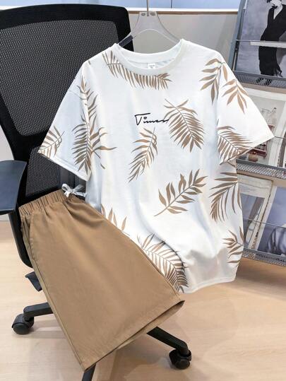 SHEIN مجموعة 2 قطعة تيشرت برسومات أوراق استوائية وشورت بخصر رباط ،ملابس الربيع للمراهقين، ملابس أولاد المراهقين ، سترات أولاد المراهقين، عودة المدرسة للربيع