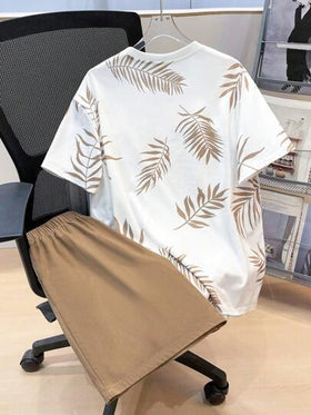 SHEIN مجموعة 2 قطعة تيشرت برسومات أوراق استوائية وشورت بخصر رباط ،ملابس الربيع للمراهقين، ملابس أولاد المراهقين ، سترات أولاد المراهقين، عودة المدرسة للربيع
