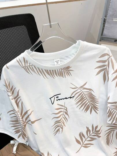 SHEIN مجموعة 2 قطعة تيشرت برسومات أوراق استوائية وشورت بخصر رباط ،ملابس الربيع للمراهقين، ملابس أولاد المراهقين ، سترات أولاد المراهقين، عودة المدرسة للربيع