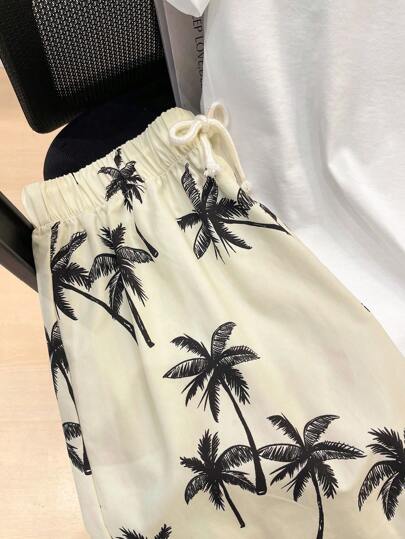 SHEIN مجموعة ذات قطعتين من قصيرة الأكمام وشورت للفتيان المراهقين، بتصميم كاجوال لليومي والحفلات والموسيقى، مناسبة للربيع والصيف، مطبوعة بأشجار جوز الهند، قصير بطلة استوائية