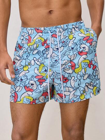 SHEIN X The Smurfs شورت كاجوال للرجال فضفاض منسوج مطبوع بالكرتون على السطح الأزرق، للشاطئ الهاواي