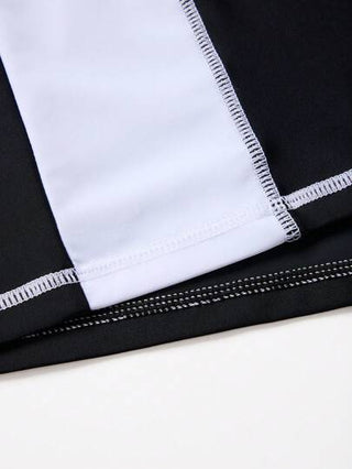 Manfinity Swimmode تي شيرت الرجال المطبوع بحروف مكتوبة مع لون كتل متباين بالتصميم المناسب للتزلج على الأمواج