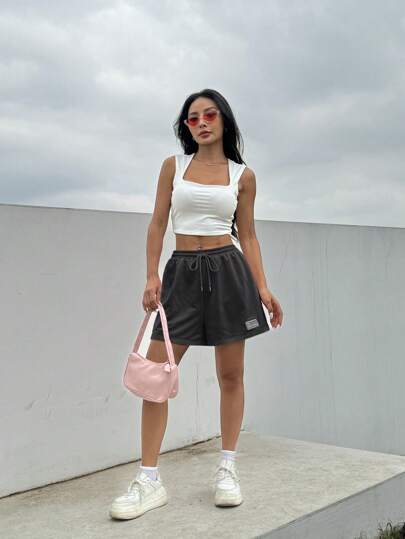 SHEIN EZwear شورت رياضي صيفي فضفاض وكاجوال باللون الوردي ، بخصر سحاب وتفاصيل رقع