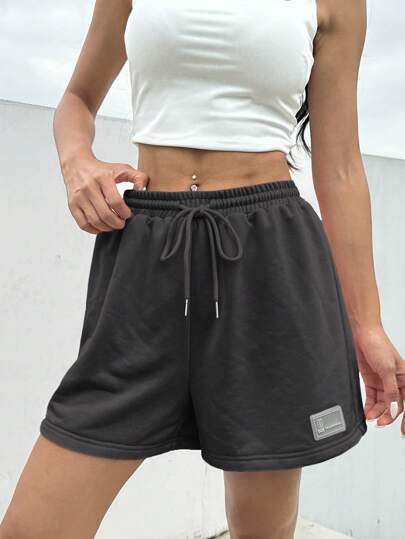 SHEIN EZwear شورت رياضي صيفي فضفاض وكاجوال باللون الوردي ، بخصر سحاب وتفاصيل رقع