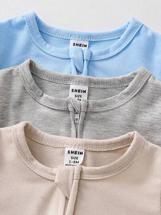 SHEIN مجموعة 3 قطع من بدلات النوم المبطنة للحديثي الولادة ذات الأكمام الطويلة والأرجل بألوان الأزرق والبيج والرمادي