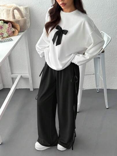 طقم حريمي قطعتين EZwear طقم سيدات مكون من: ملابس علوية طويلة الأكمام بياقة مستديرة مزينة بفيونكة وبنطال طويل ، كاجوال