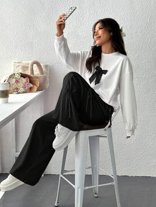 طقم حريمي قطعتين EZwear طقم سيدات مكون من: ملابس علوية طويلة الأكمام بياقة مستديرة مزينة بفيونكة وبنطال طويل ، كاجوال