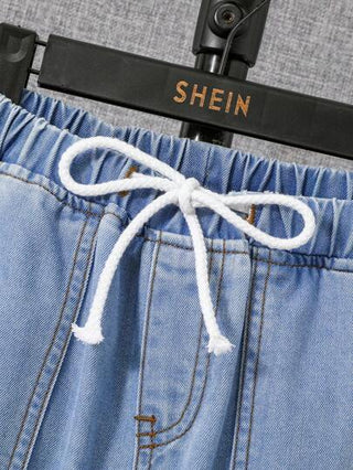 SHEIN ملابس أولاد المراهقين الكاجوال مصممة بجيوب، ملابس رائعة لولائم للأولاد، بناطيل جينز واسعة ومرنة بخصر مطاطي وسير ربط، ملابس مريحة للاستخدام اليومي، ملابس الأطفال للموسم الخريفي والشتوي