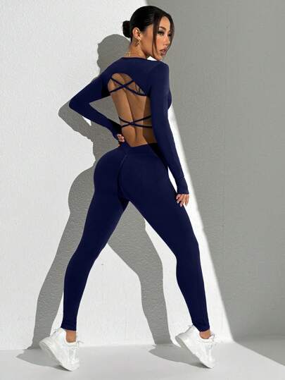 SHEIN Sport Studio طقم رياضي بدون ظهر أكمام طويلة وبنطلون لون أحادي سلس