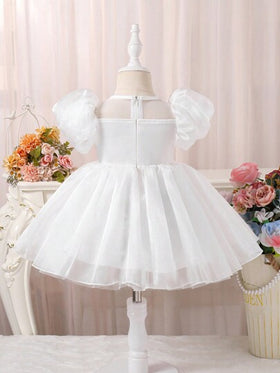 Glamorique Kids فستان الأميرة الأنيق والحلو والفاخر للبنات عمر 1-3 سنوات, أبيض نقي ، بأكمام منتفخة من التول، طبقات من شبكة براقة ، تطريز خياطة الدانتيل وتصميم فيونكة ضخمة على الخصر لأناقة ورقة مميزة