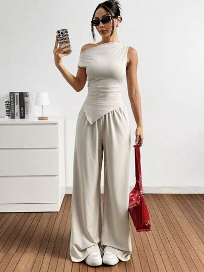 EZwear مجموعة بنطال وبلوزة غير متماثلة بلون أحادي للنساء لارتداء اليومي