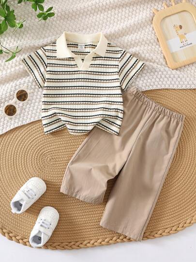 SHEIN مجموعة ملابس علوية قصير الأكمام مع أزرار وبنطال ذو خصر مطاطي، اللون مخطط لطفل/طفلة