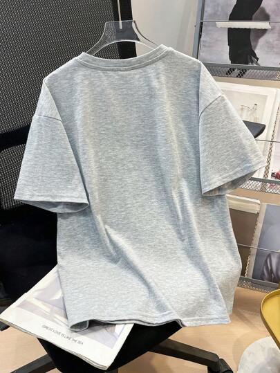 SHEIN تي شيرت رياضي كاجوال فضفاض بياقة مستديرة مطبوع للأولاد منذوقين