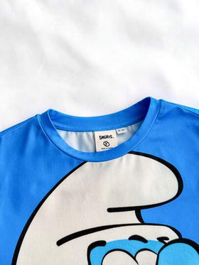 SHEIN X The Smurfs مجموعة تي شيرت وشورت لطفل راق بطباعة رسوم كرتونية رياضية كاجوال باللون الأزرق ، مناسبة لجميع الفصول، قطعتان