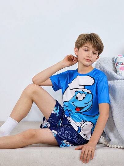SHEIN X The Smurfs مجموعة تي شيرت وشورت لطفل راق بطباعة رسوم كرتونية رياضية كاجوال باللون الأزرق ، مناسبة لجميع الفصول، قطعتان