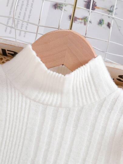 مجموعة لطفلة: تي شيرت بأكمام طويلة ذو ياقة عالية بسيط + تنورة مكسرة مزينة بفيونكة ، مناسبة للخروجات